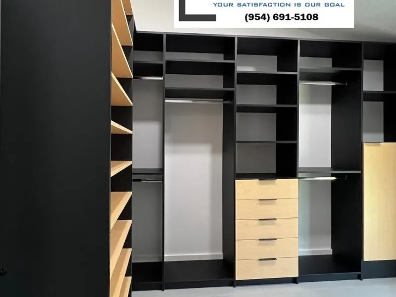 Custom built-in closet with white shelving and clean cabinetry — handyman and built-in services by South Blue Enterprises in Deerfield Beach, FL